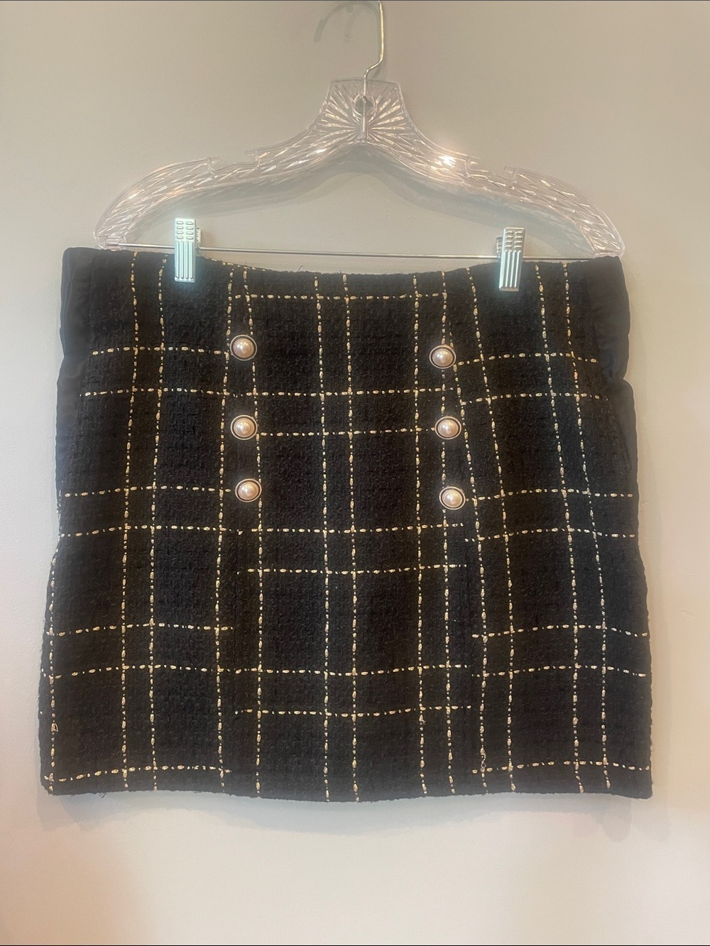 Black straight short skirt with gold accents